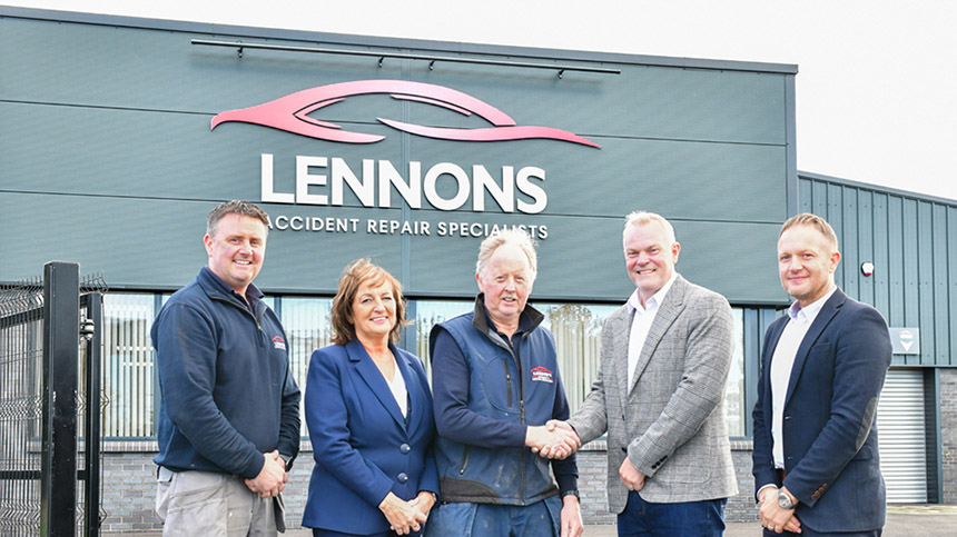 Fix Auto UK operations director Mark Hutchins (2nd right) welcomes John Lennon, his wife, Linda, and son, Paul, to the network after they agreed to rebrand their state-of-the-art repair centre as Fix Auto Cookstown.